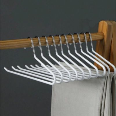 Cintre blanc suspendu penderie 2 pantalons