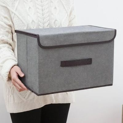boite de rangement gris taille L porte par une femme facilement