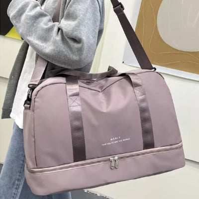 sac voyage rose porte en bandoulière femme