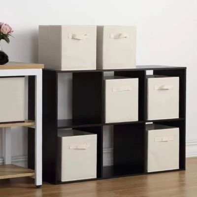 boite de rangement en tissu beige dans meuble etagere rendu beau