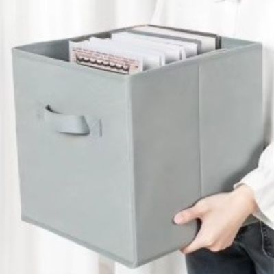 boite de rangement en tissu gris transporte femme facilement