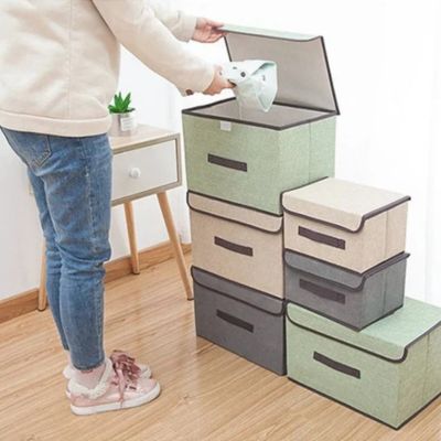 boîte de rangement en tissus emplié d'afférentes taille femme range habit