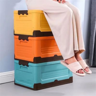 boite de rangement plastique 3 boite empilees femme assis dessus solide