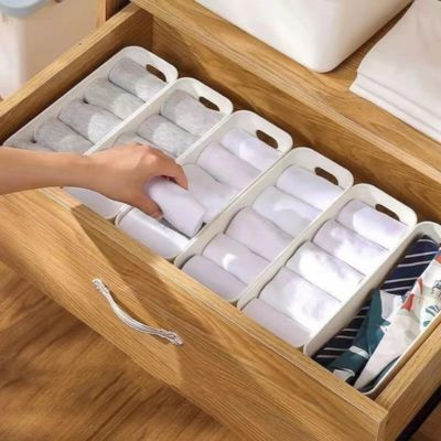 boite de rangement plastique dispose en enfilade dans un tiroir rendu facile trouve chercher