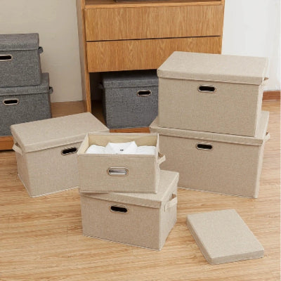boite de rangement pour vetement beige empile