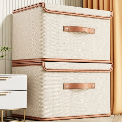 boite de rangement vetement beige poignée et contour similicuir