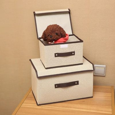 boite de rangement vetement beige polyvalente empile boite ouverte peluche