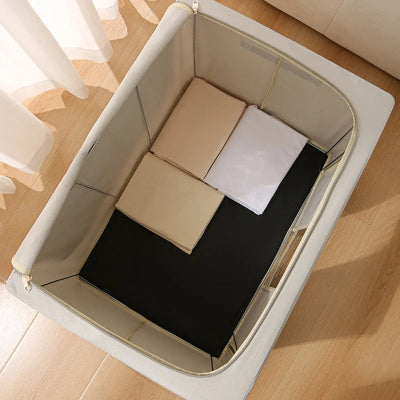 boite de rangement vetement ouverte drap à l'intérieur