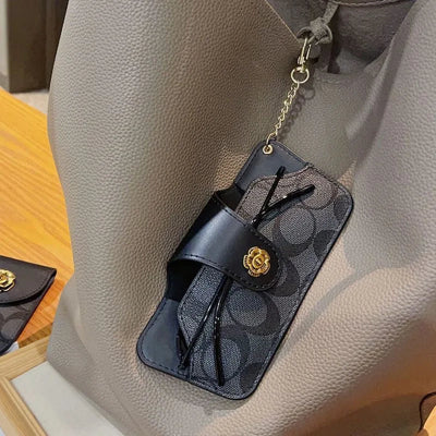 étui à lunette noir suspendu porte-clés sac à main