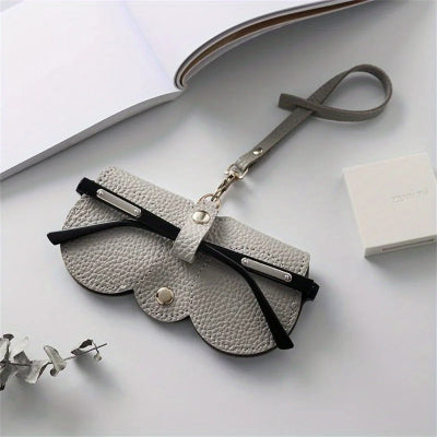 étui à lunettes gris avec lanière