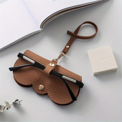 étui à lunettes marron avec lanière