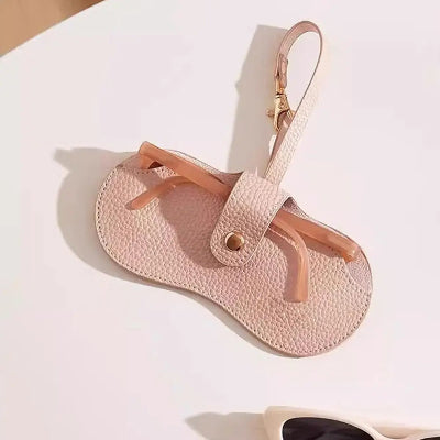 étui à lunettes rose avec lanière