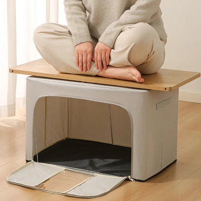 femme assise sur boite de rangement vetement solidité durable
