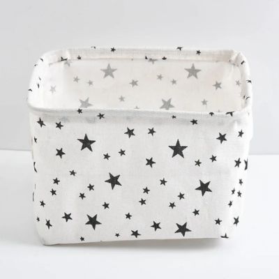 panier rangement blanc étoiles noir poignées renforcées