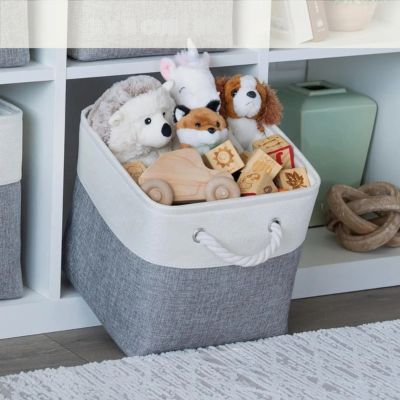 paniers de rangement gris blanc rempli jouet pratique efficace