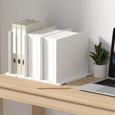 rangement sac à main dressing utilisé comme séparateur livre bureau