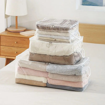 sac de rangement vêtement empilé lit chevet chambre