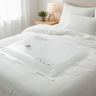 sac vetement sous vide pose lit blanc
